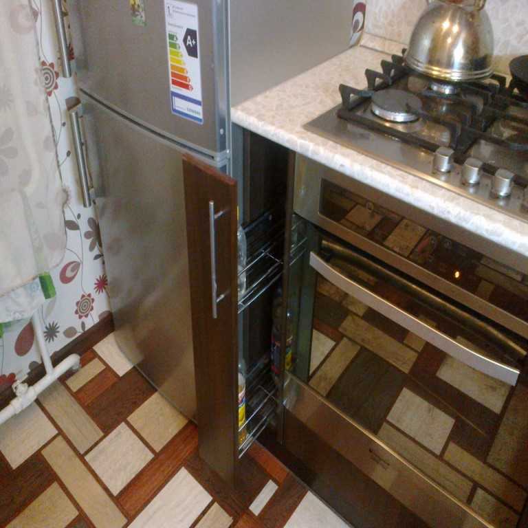 Холодильник рядом с плитой: какое расстояние должно быть между ними