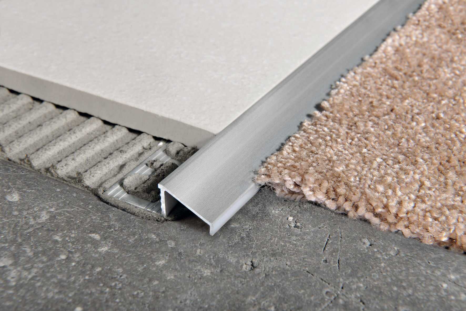 Порожек для плитки и ламината: как правильно положить его между покрытиями – советы по ремонту